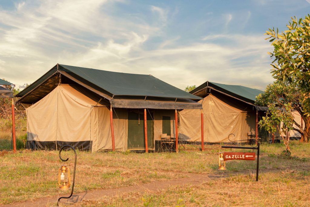 Tent and outdoor setting at Heritage Mara River Camp
